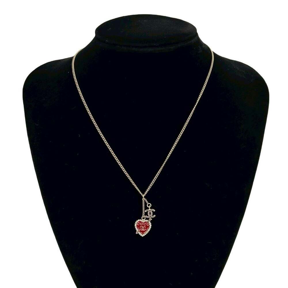 CHANEL Red Logo Necklace